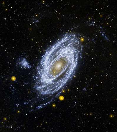 The galaxy M81 as seen the GALEX explorer in ultraviolet light. Courtesy NASA.