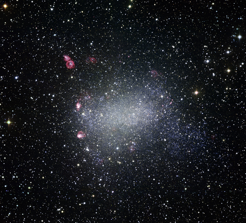 Barnards Galaxy glows beneath a sea of foreground stars in the direction of the constellation of Sagittarius (the Archer). This amazing portrait comes to us courtesy of an instrument called the Wide Field Imager (WFI) attached to the 2.2-meter MPG/ESO telescope at ESO's La Silla  Observatory in northern Chile.  (Click to embiggen.) Courtesy ESO. 