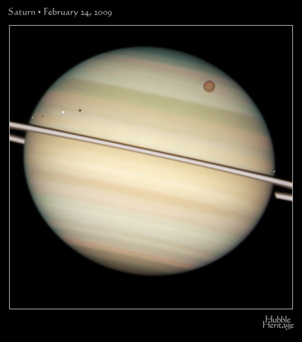 A Hubble Heritage view of the Saturn transit. (Click to embiggen.)